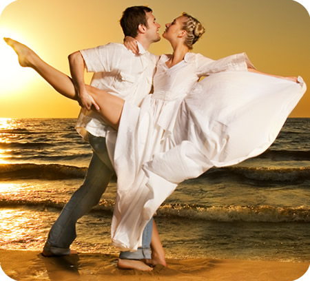 couple dancing on beach